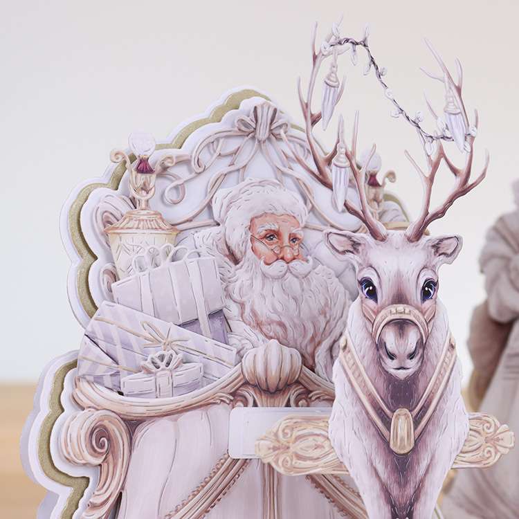 Card made using ready For A White Christmas Special Edition Vignette with Father Christmas in a sleigh and a Reindeer in the foreground