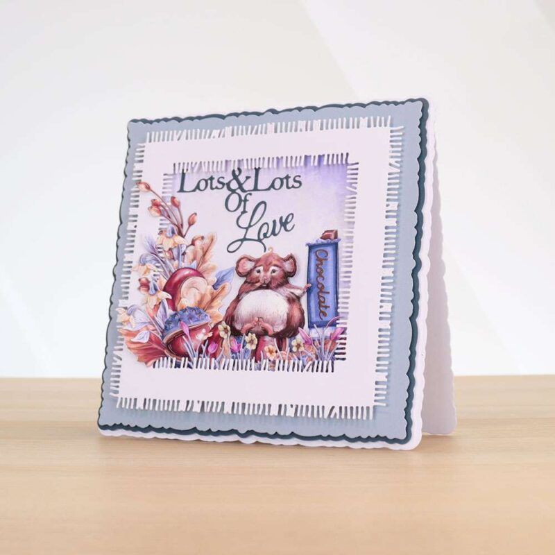 Card made using Beautifully Brisk Special Edition Vignette with a mouse indulging in some chocolate, surrounded by florals and conkers