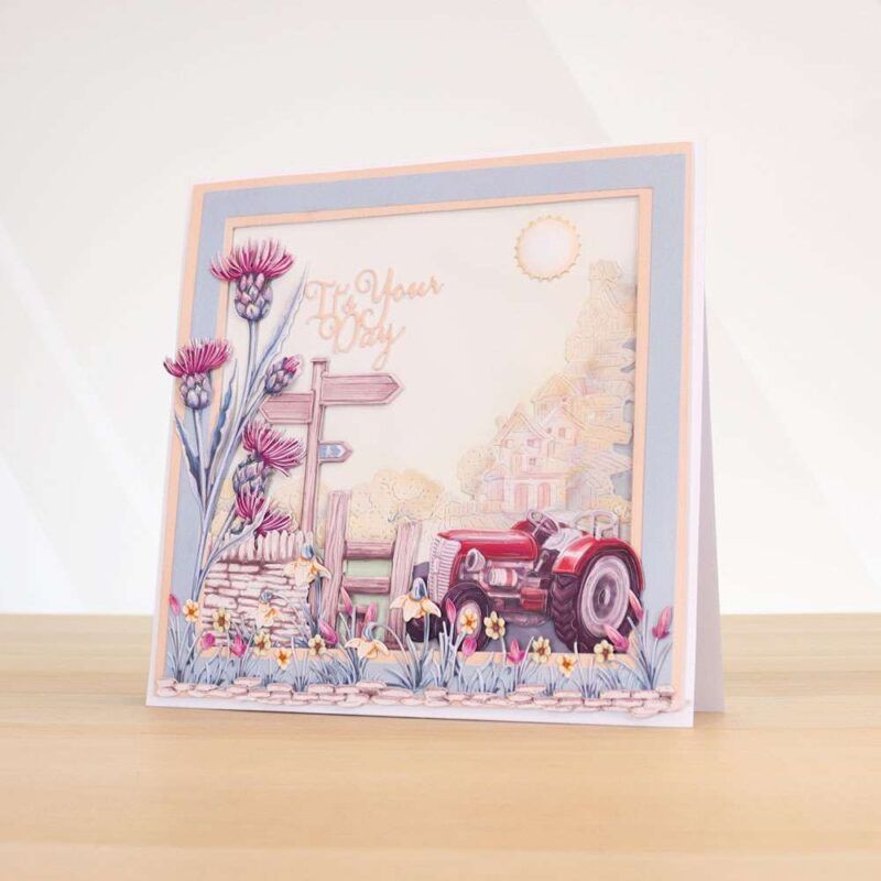 Card made using Beautifully Brisk Special Edition Vignette with a tractor, fence, wall and signs in the foreground