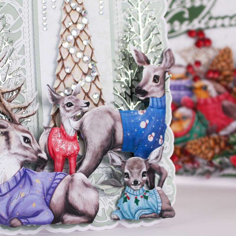 Card made using Christmas Jumper Special Edition Vignette with a deer family at the front wearing Christmas jumpers