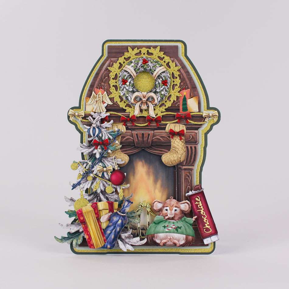 Card made using Christmas Jumper Special Edition Vignette with a mouse enjoying a bar of chocolate next the a fireplace