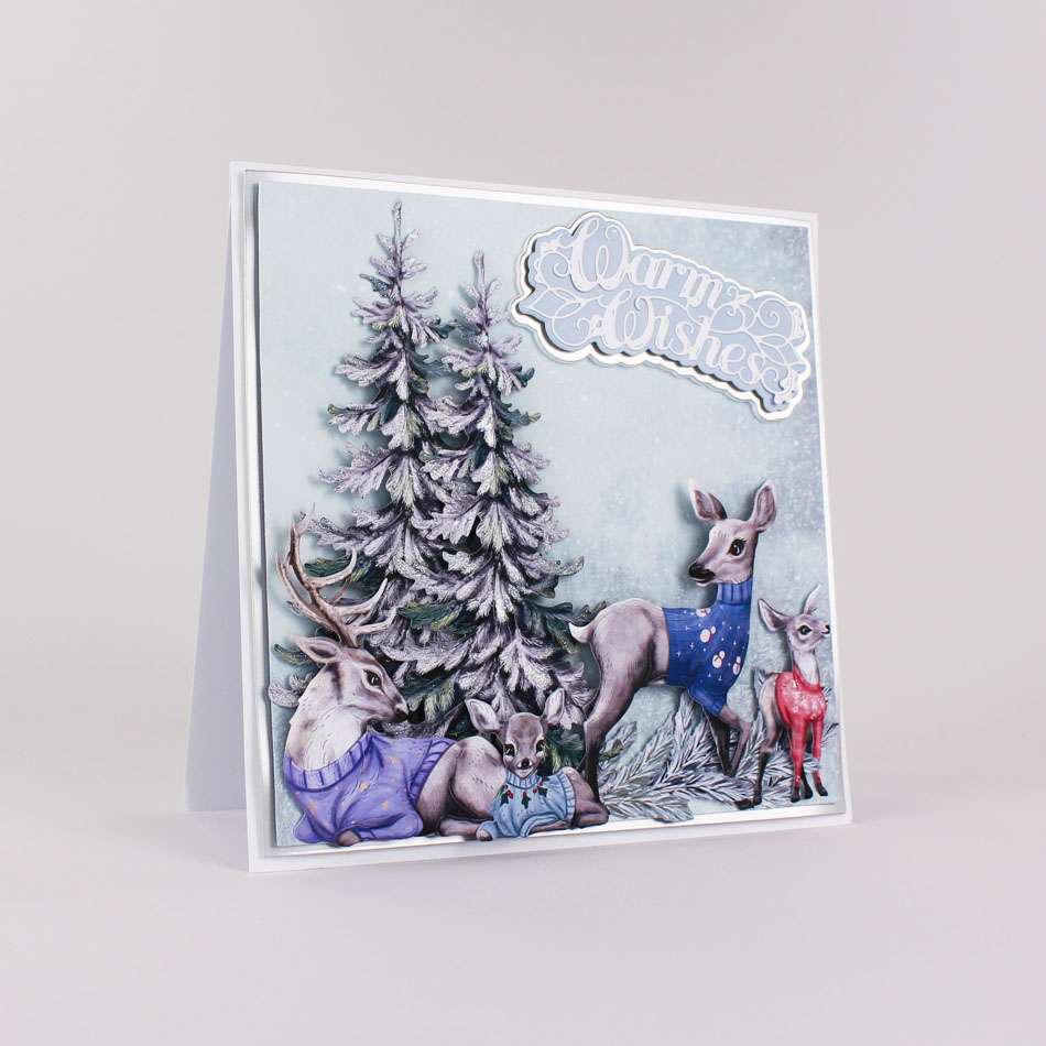 Card made using Christmas Jumper Special Edition Vignette with a deer family at the front wearing Christmas jumpers