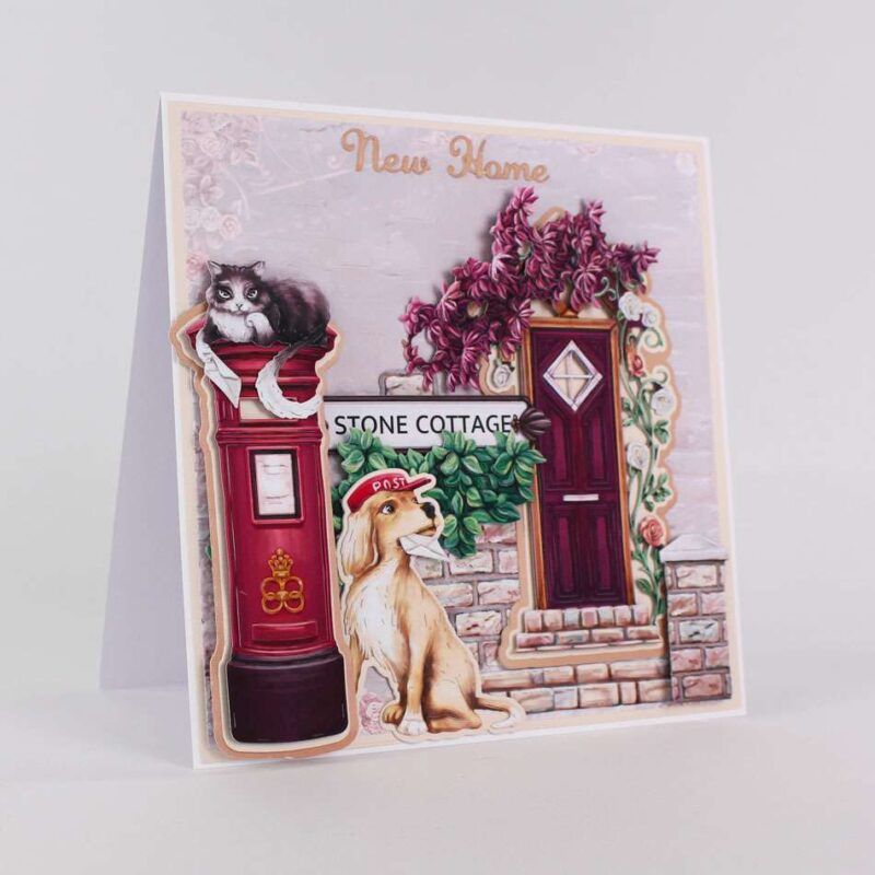 Card made using the Grand Gardens Special Edition Vignette with the delivery dog and cat next to a post box and an entrance with florals over it