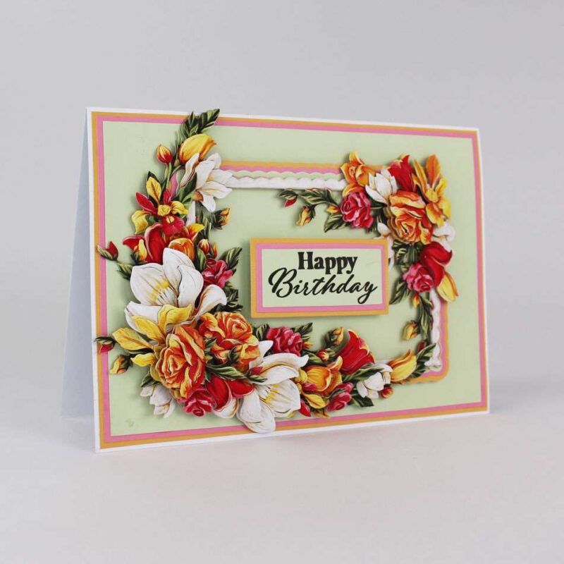 Card made using the Summer Bliss Special Edition Vignette with a Happy Birthday sentiment in the centre, surrounded by florals