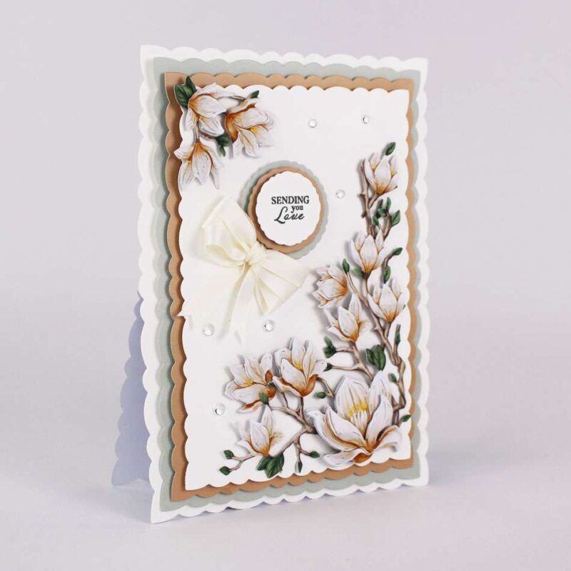 Card made using the Summer Bliss Special Edition Vignette with a white background and florals covering the bottom and top of the card