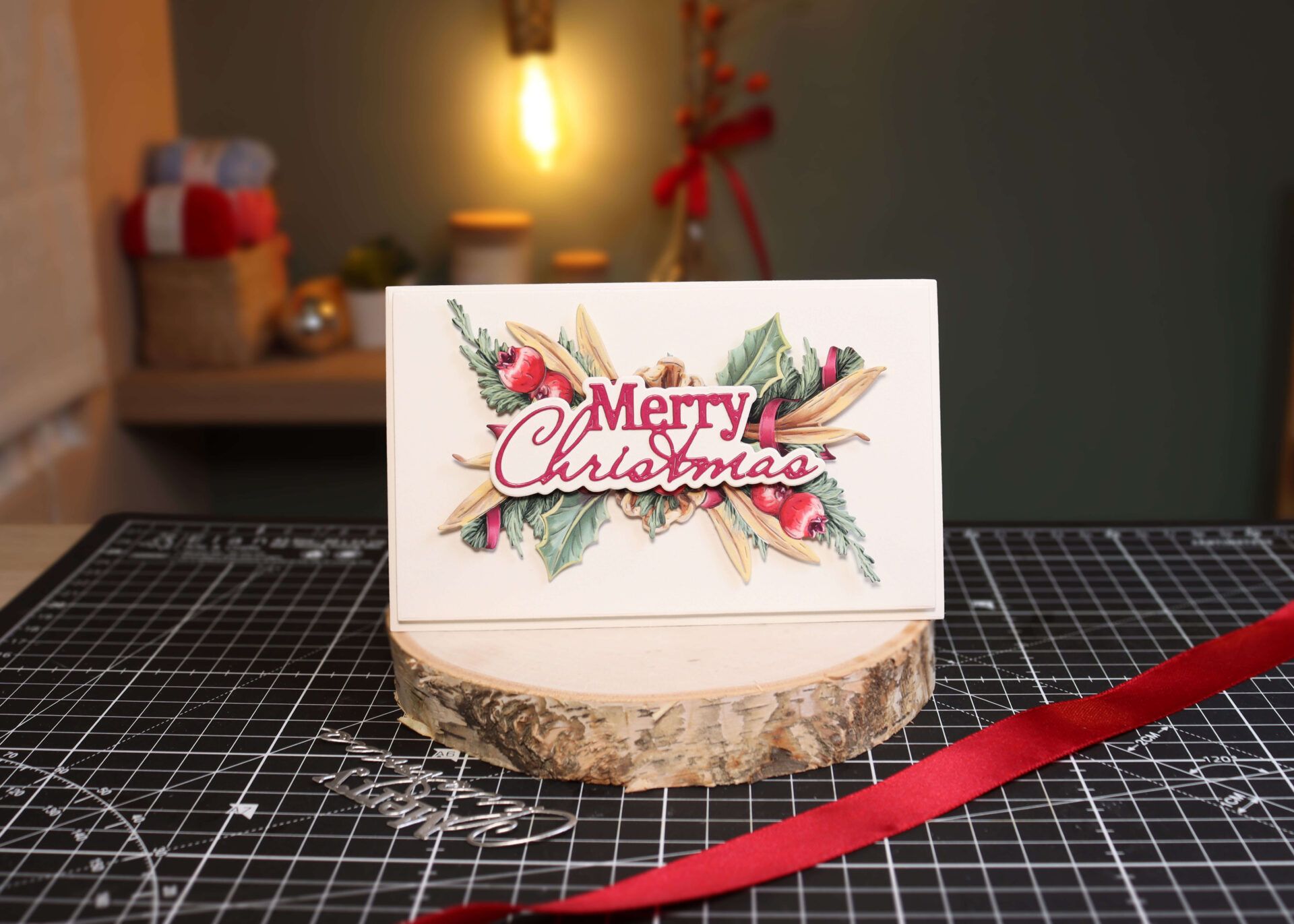A simple Christmas card with a die cut sentiment and Christmas florals