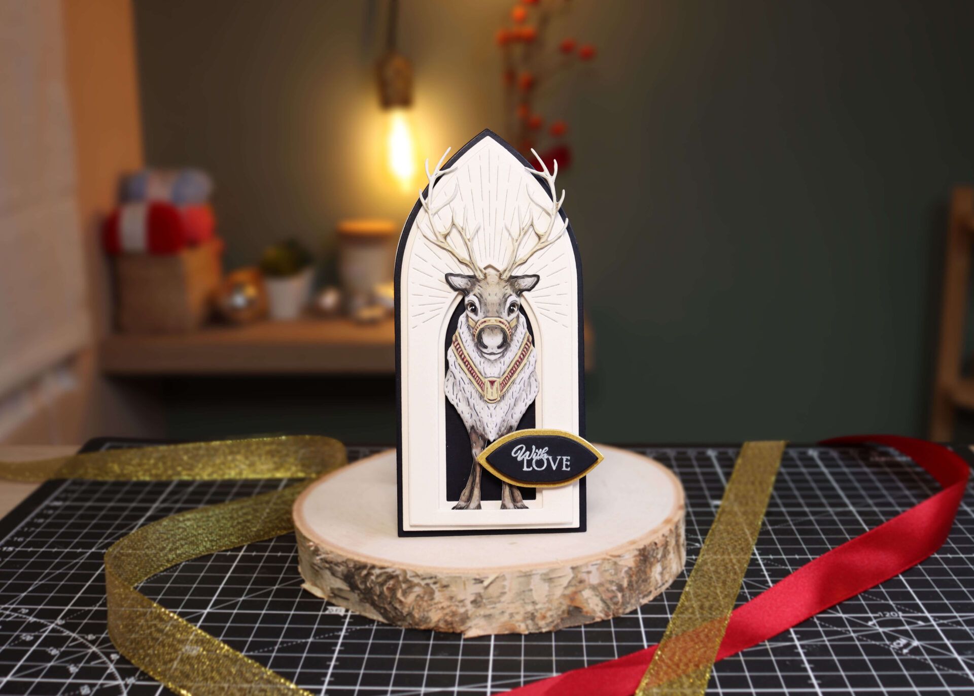 A simple Christmas card with reindeer topper