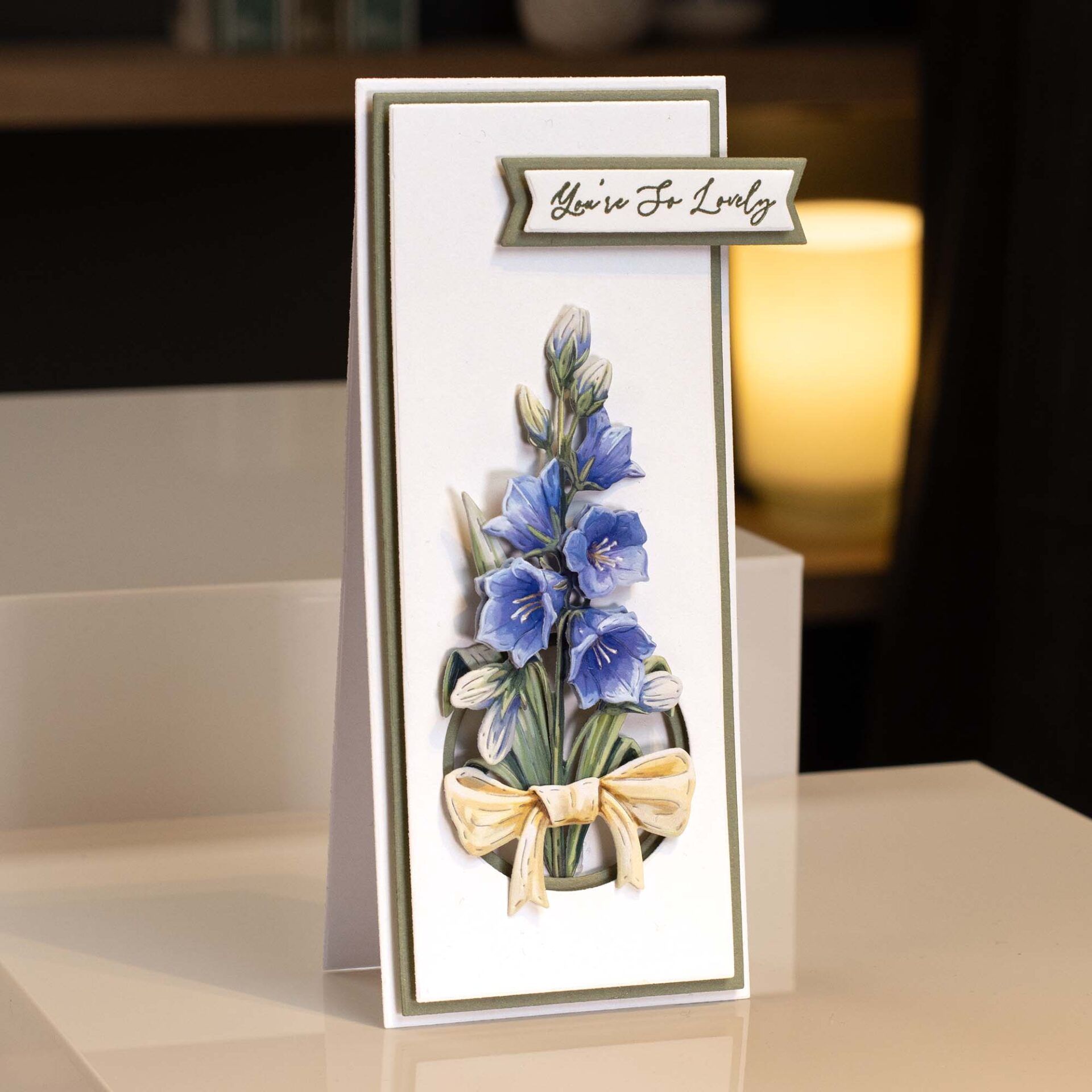 a simple DL shaped card with blue flowers